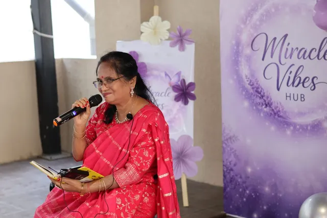 Purabi Bordoloi singing into a microphone